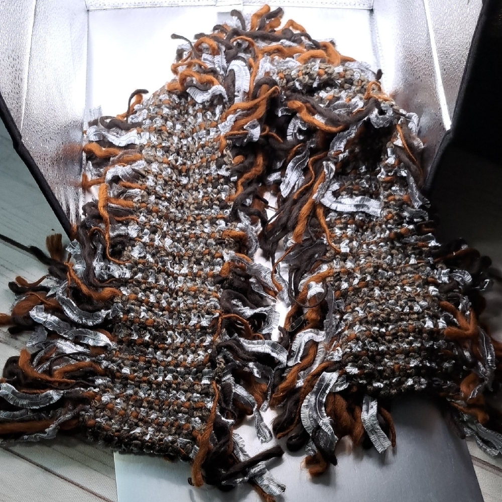 Eyeful Fringe Knit Scarf in Brown And Silver Has Faux Feather Detail